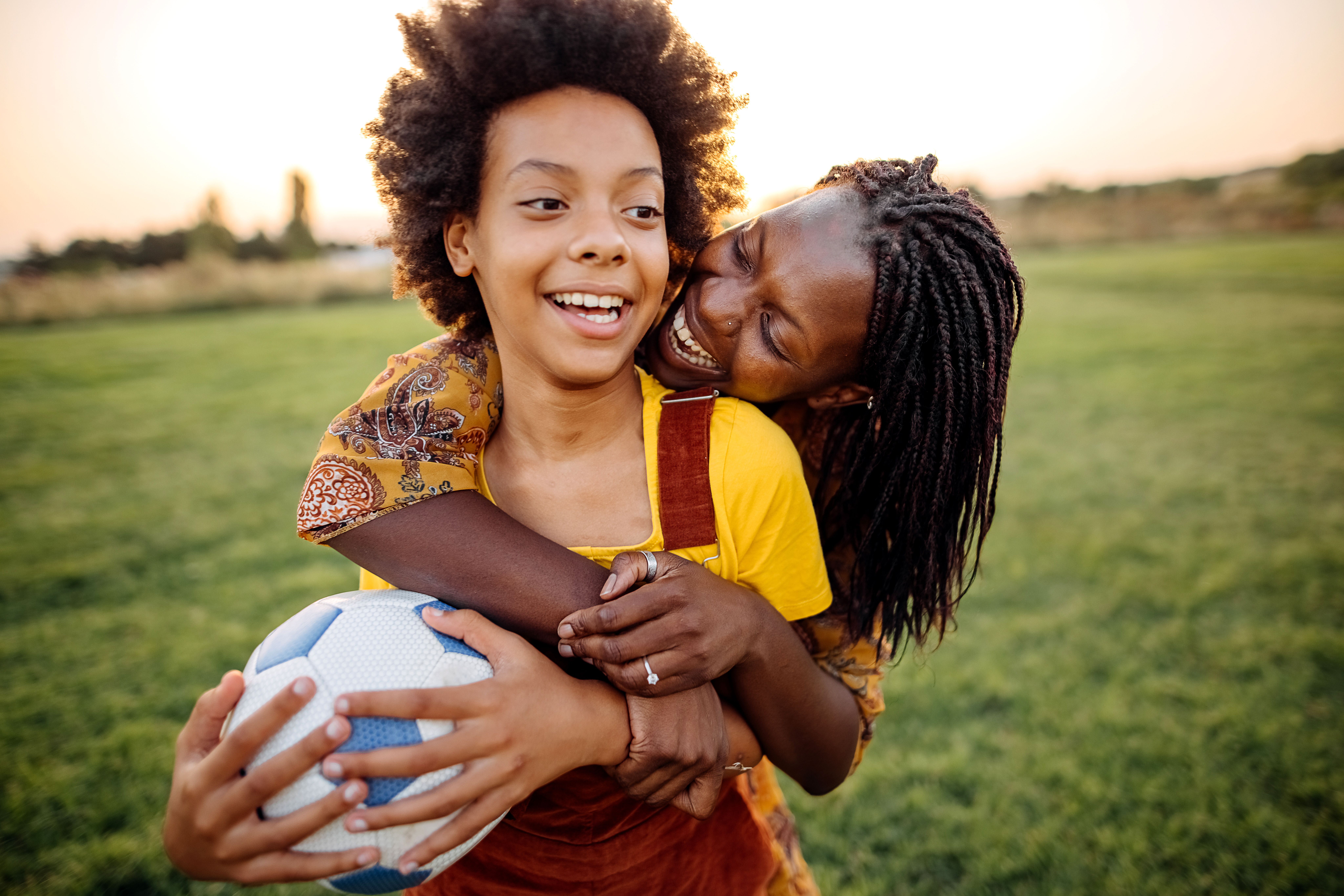 Parent and child playing outside